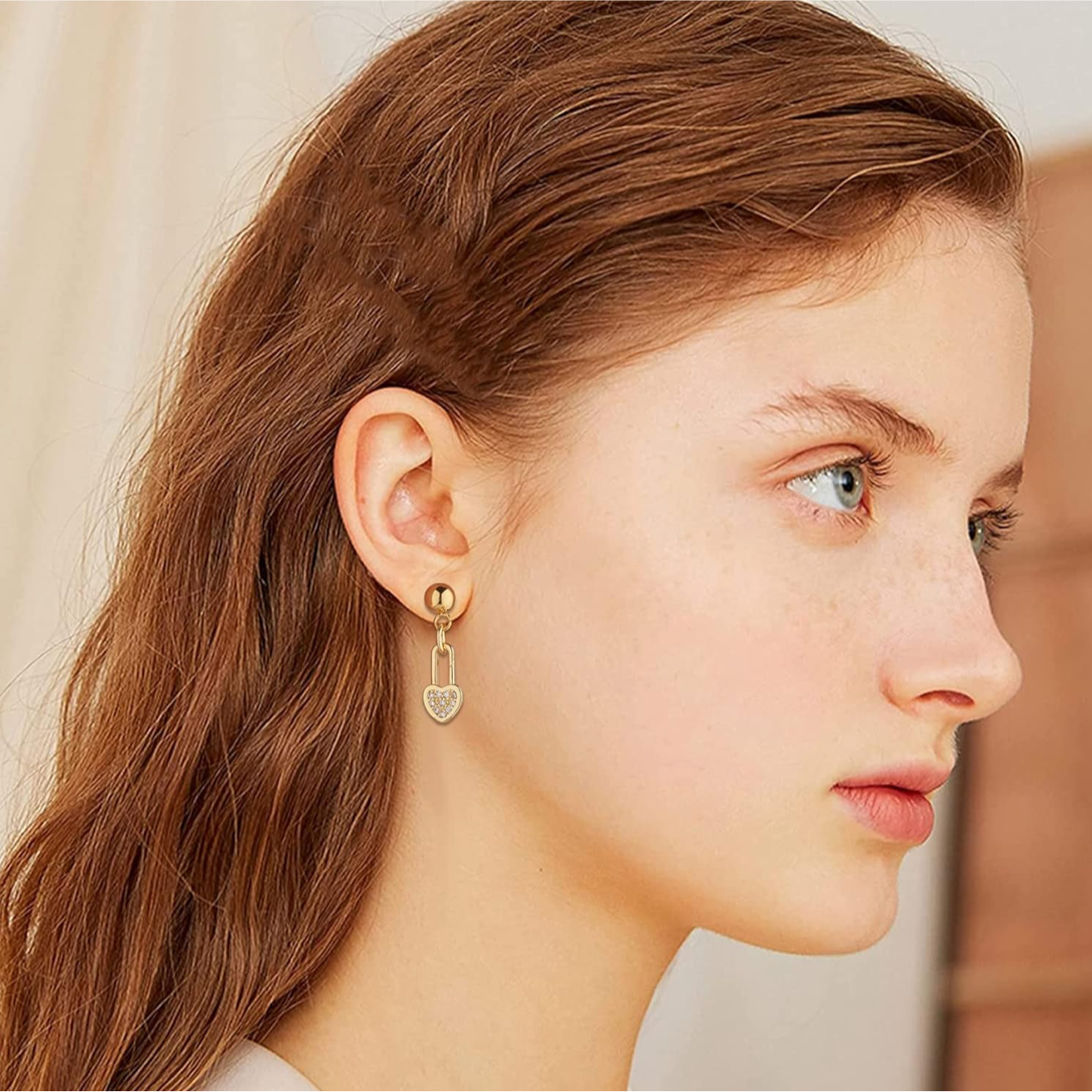 Herzförmiger Schloss-Anhänger mit funkelnden Steinen